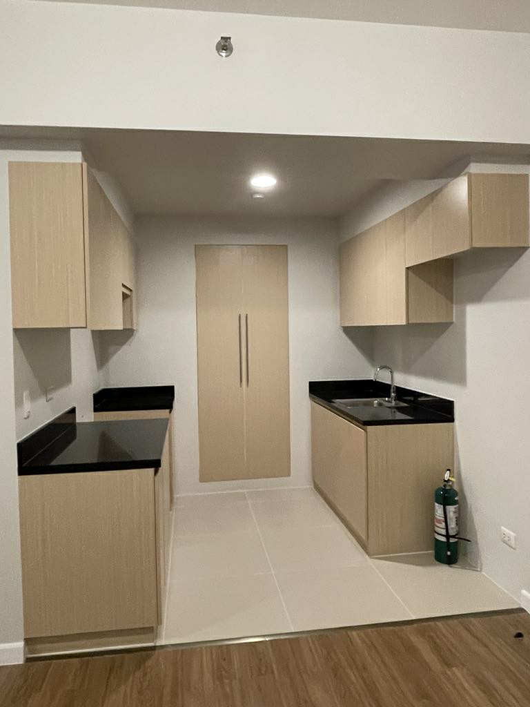 Travertine at Portico Condominium